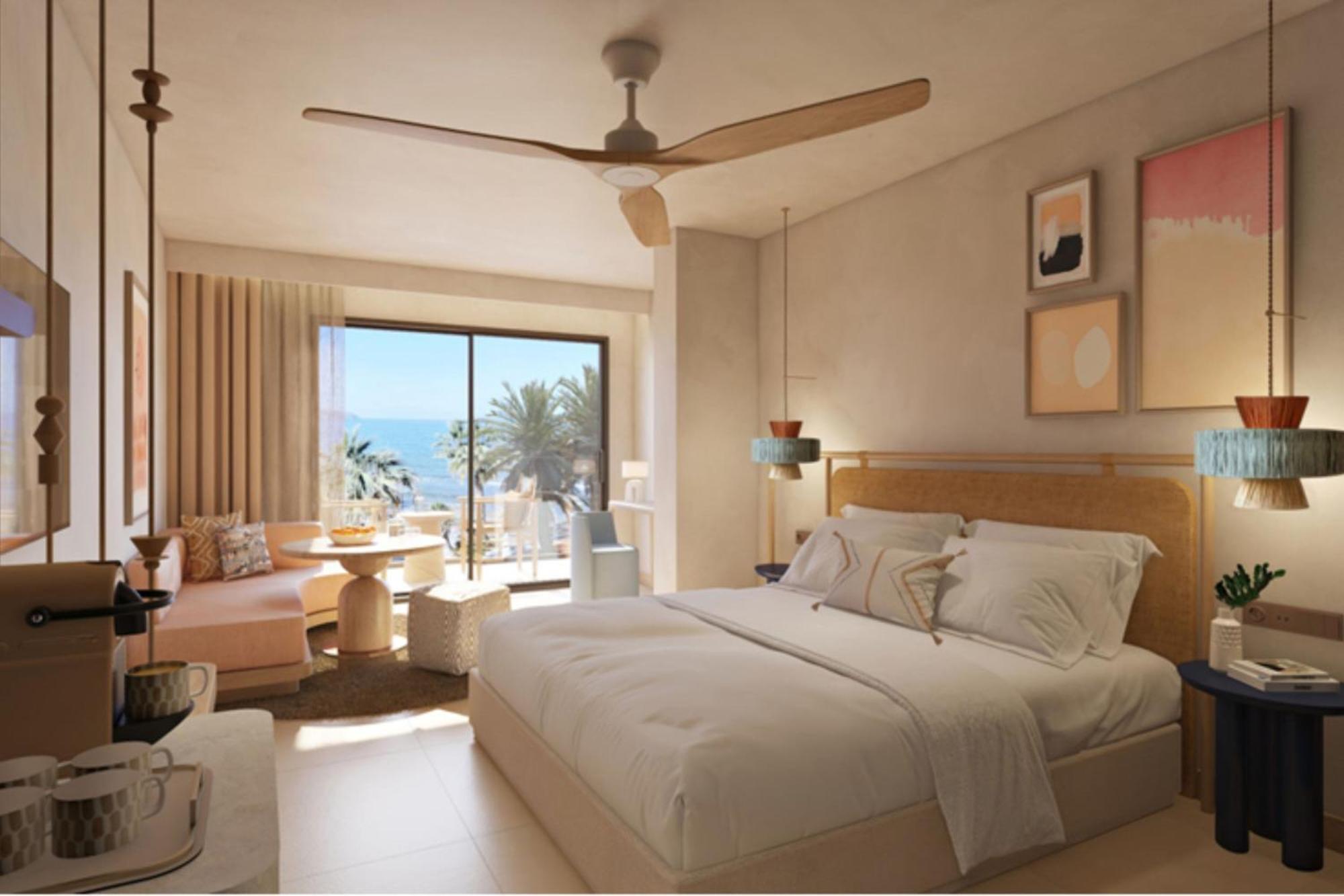Superior kamer met kingsize bed en een balkon met uitzicht op zee